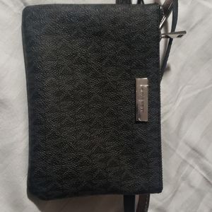 Michael Kors waits bag